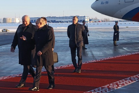 Putin holds talks in Belarus; EU reaches deal to temporarily cap gas prices