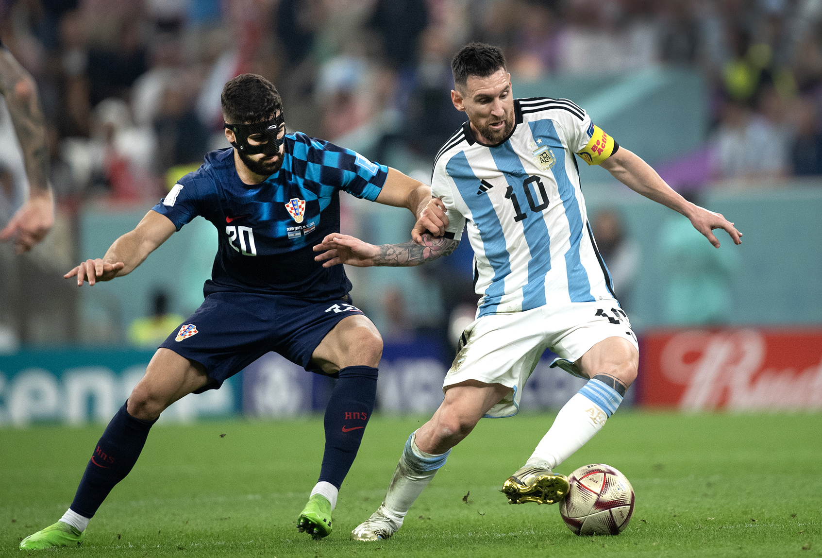 Lionel Messi of Argentina and Josko Gvardiol