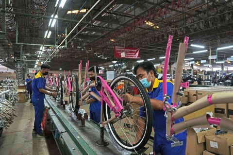 Asia factories remain under pressure as global demand slows