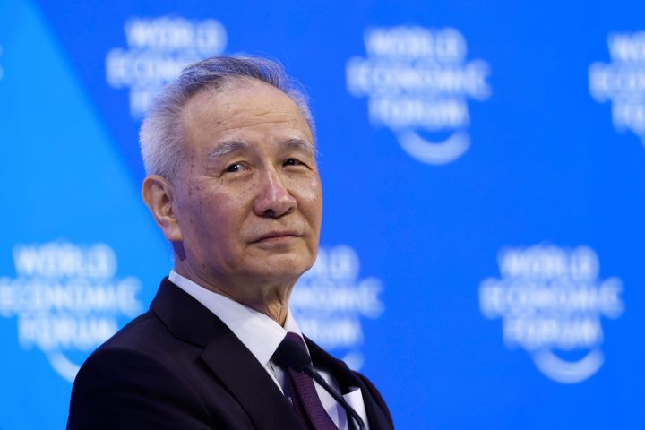 China reassures Davos that growth will return, Covid has peaked