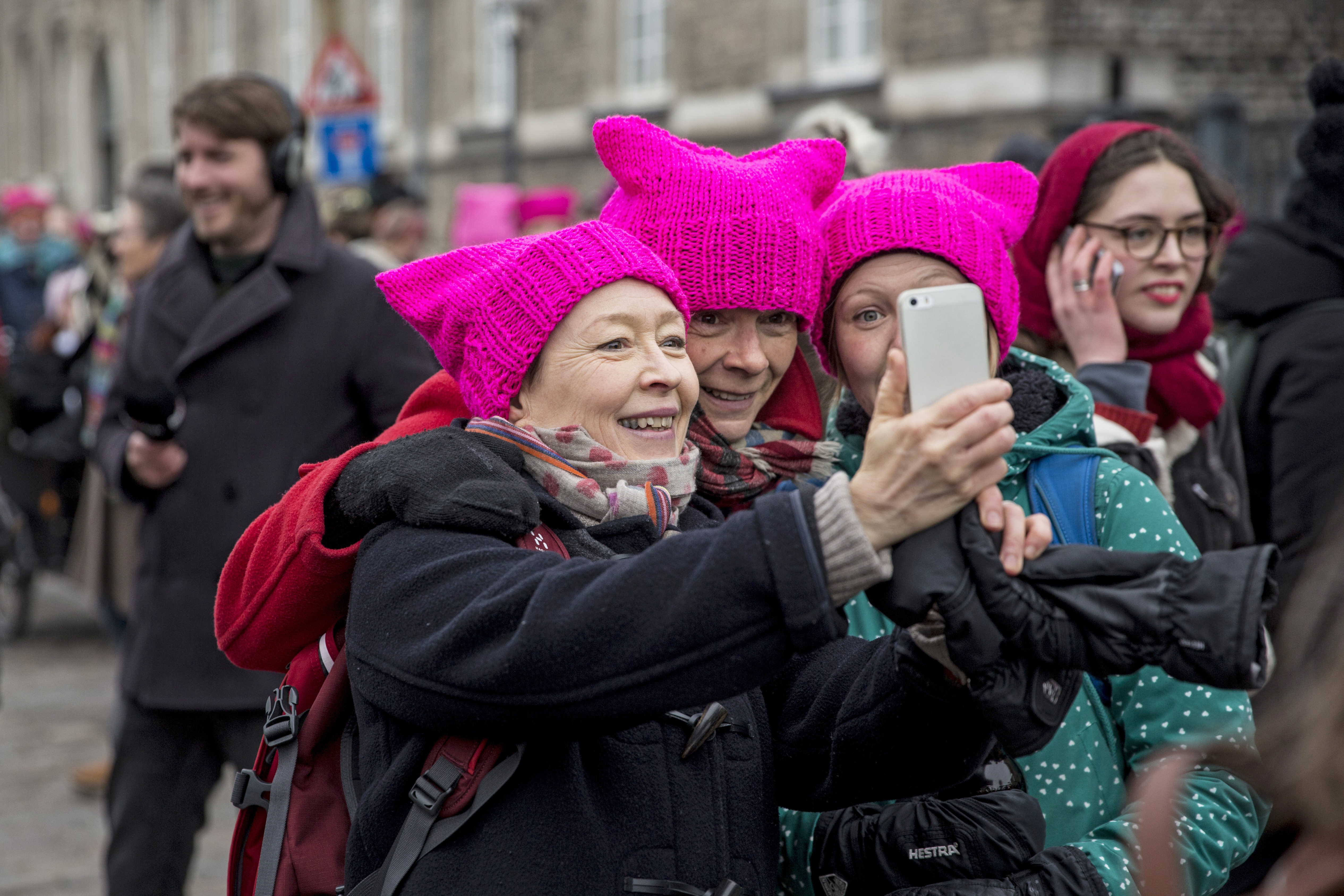 epa05837088 Women wear the pink so-called 'pussy hat' during a rally to commemorate International Women's Day in Copenhagen, Denmark, 098 March 2017. International Women's Day is celebrated globally on 08 March to promote women's rights and equality. EPA/Nikolai Linares DENMARK OUT