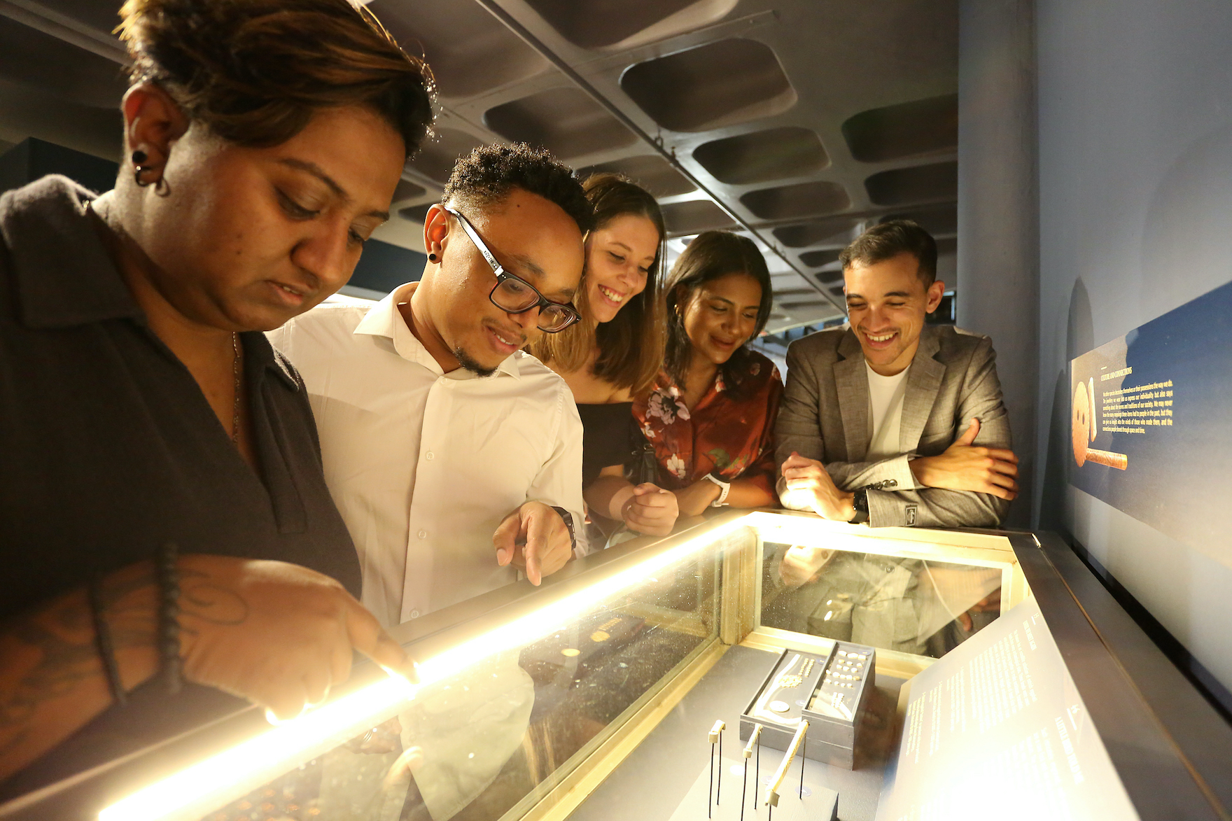 Guests examine an exhibit at the opening of the 'Hidden Wonders of the Iziko South African Museum' exhibition. Image: Nigel Pamplin/Iziko Museums of South Africa