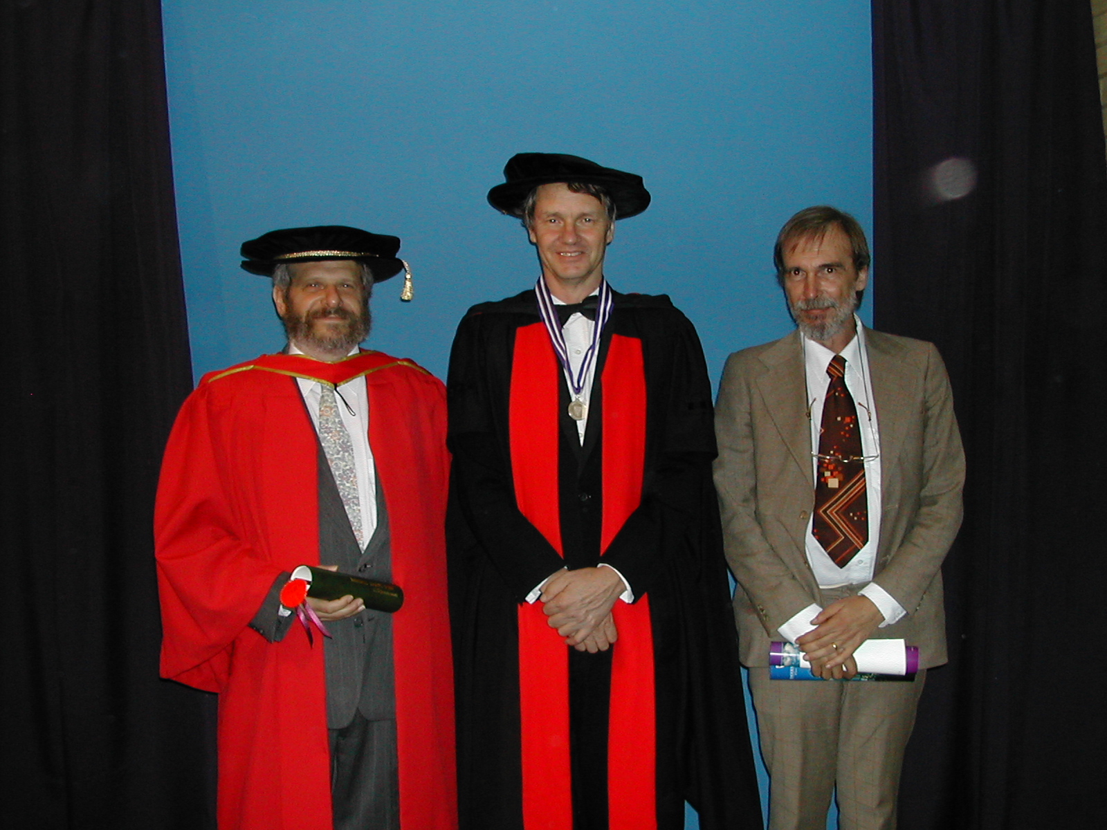In 2002, Randy Bush (left) was awarded an Honorary Doctorate from Rhodes University. To his right are Pat Terry and Jacot. Image: Supplied / François Jacot-Guillarmod