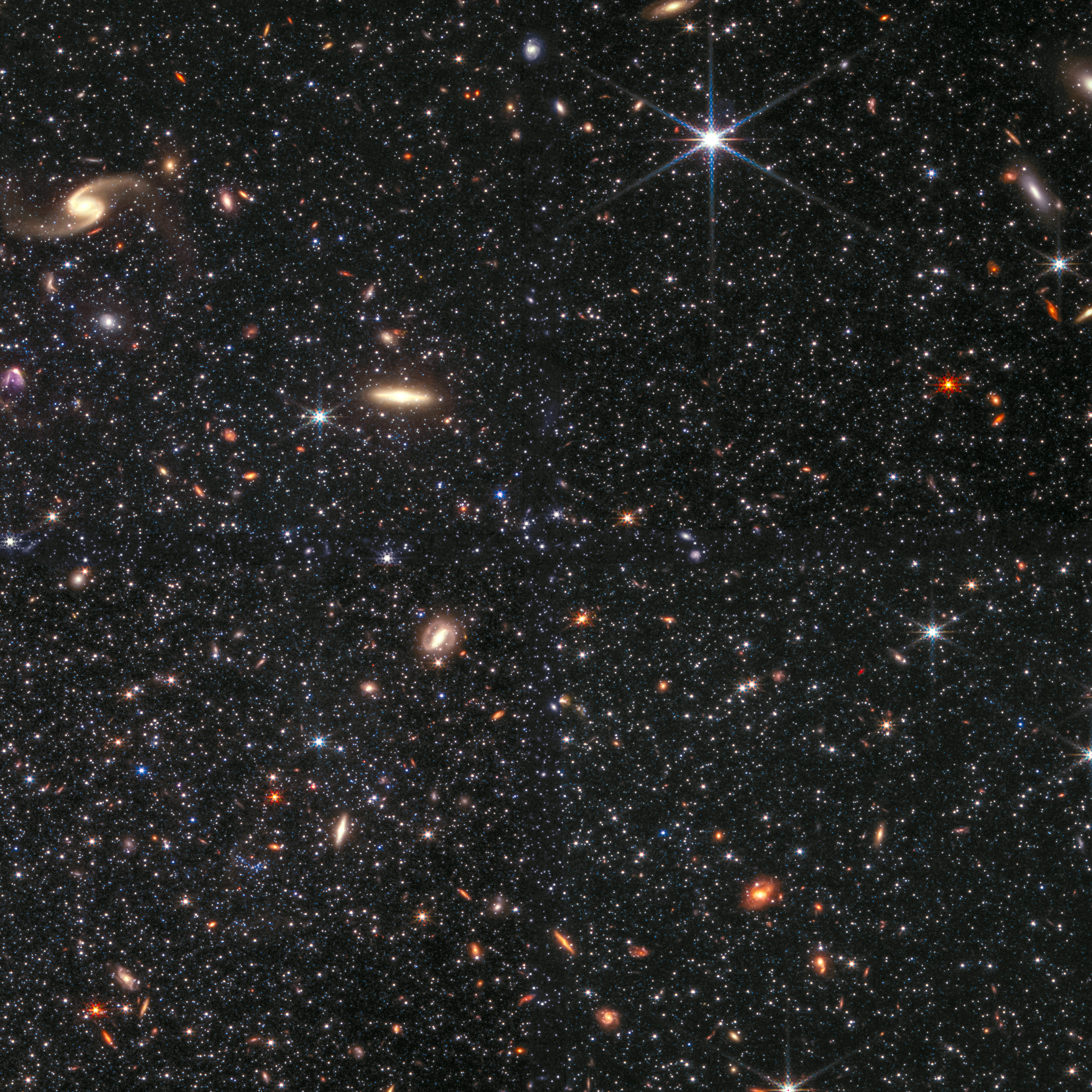 A portion of the dwarf galaxy Wolf–Lundmark–Melotte (WLM) captured by the James Webb Space Telescope’s Near-Infrared Camera. The image demonstrates Webb’s remarkable ability to resolve faint stars outside the Milky Way. Color translation: 0.9-micron light is shown in blue, 1.5-micron in cyan, 2.5-micron in yellow, and 4.3-micron in red (filters F090W, F150W, F250M, and F430M). Image: NASA, ESA, CSA, Kristen McQuinn (RU) / Zolt G. Levay (STScI)