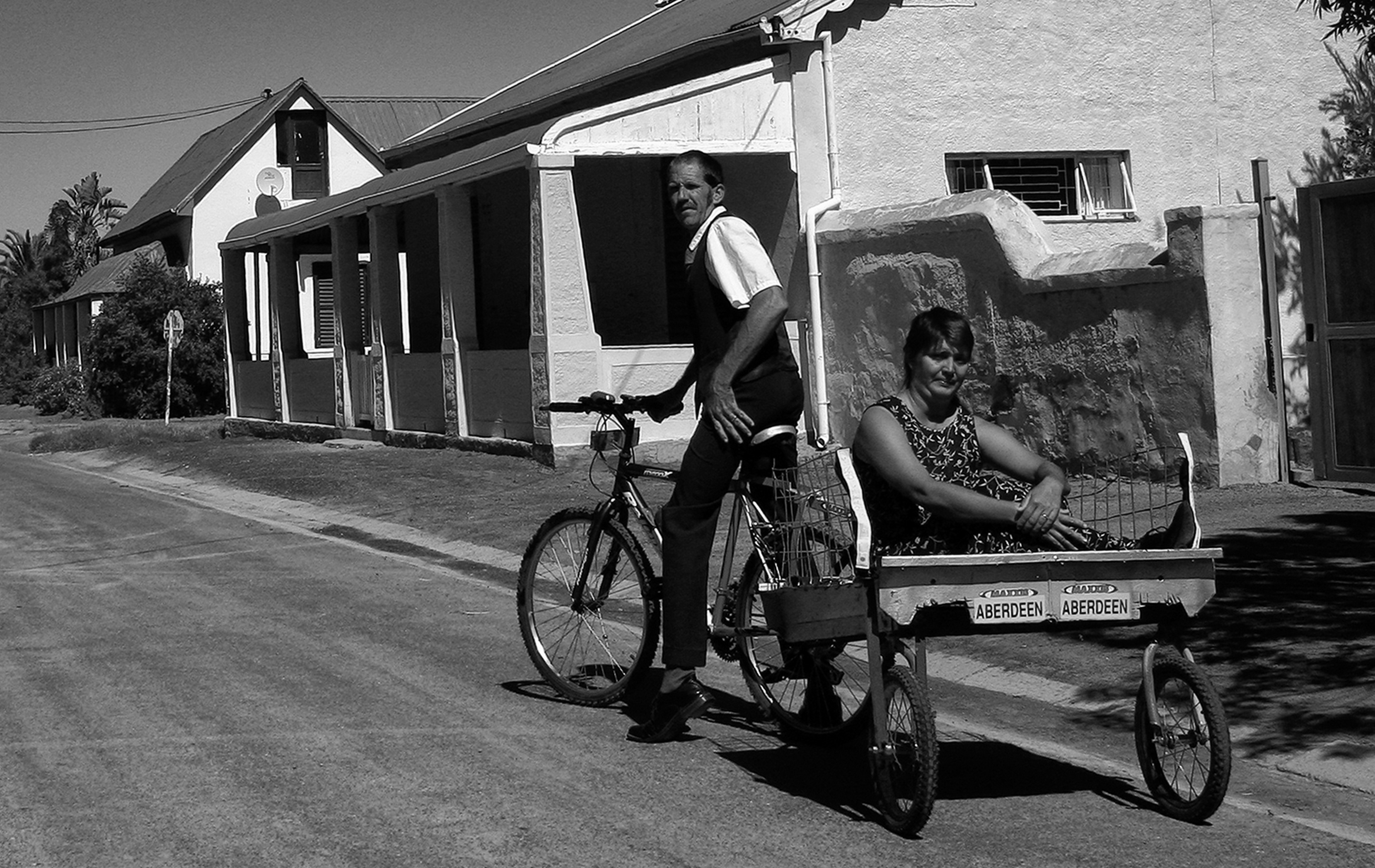 Sagrys van Jaarsveld and Johanna van Wyk in their nifty bike & cart contraption in Aberdeen. Image: Chris Marais