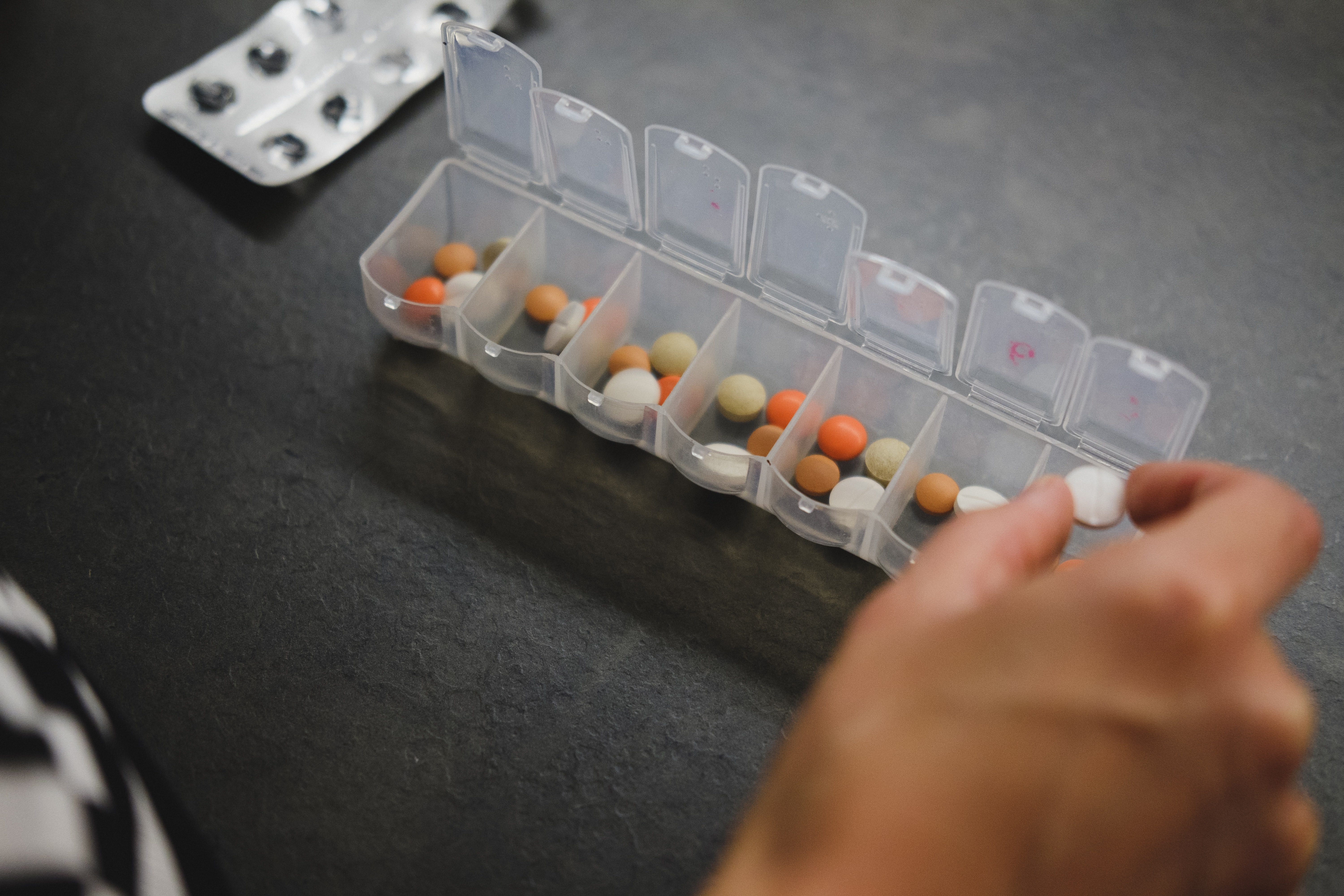 Using pill boxes is an organisational strategy that may help patients remember to take their medications. Image: Laurynas Mereckas / Unsplash