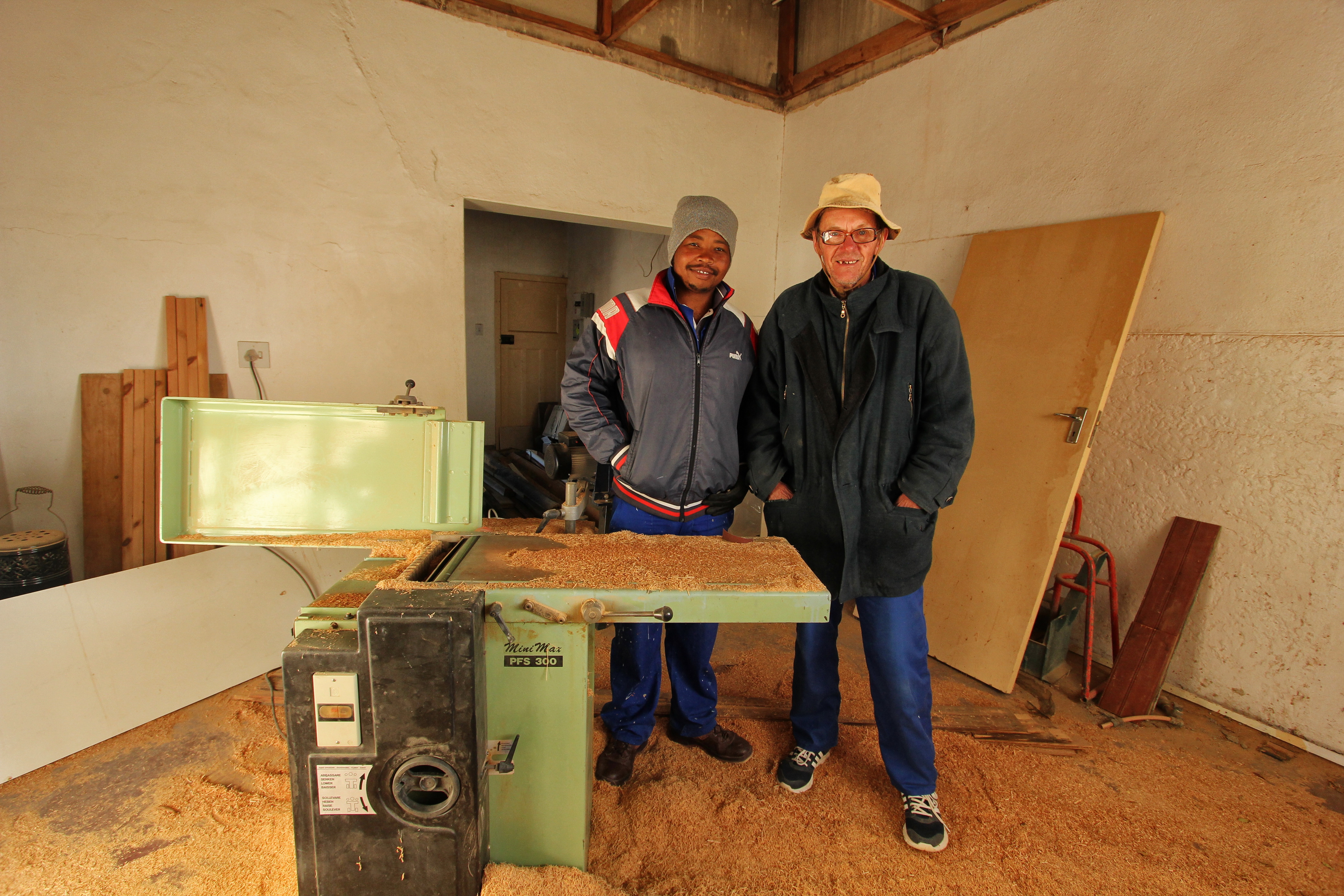 Busy in the workshop – Brandon Johnson and Anthony Cohen. Image: Chris Marais