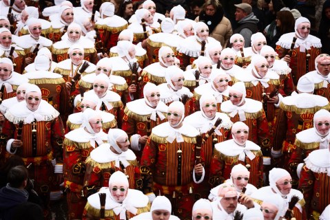 In images: Performers take to the streets for centuries old Belgian carnival of Binche