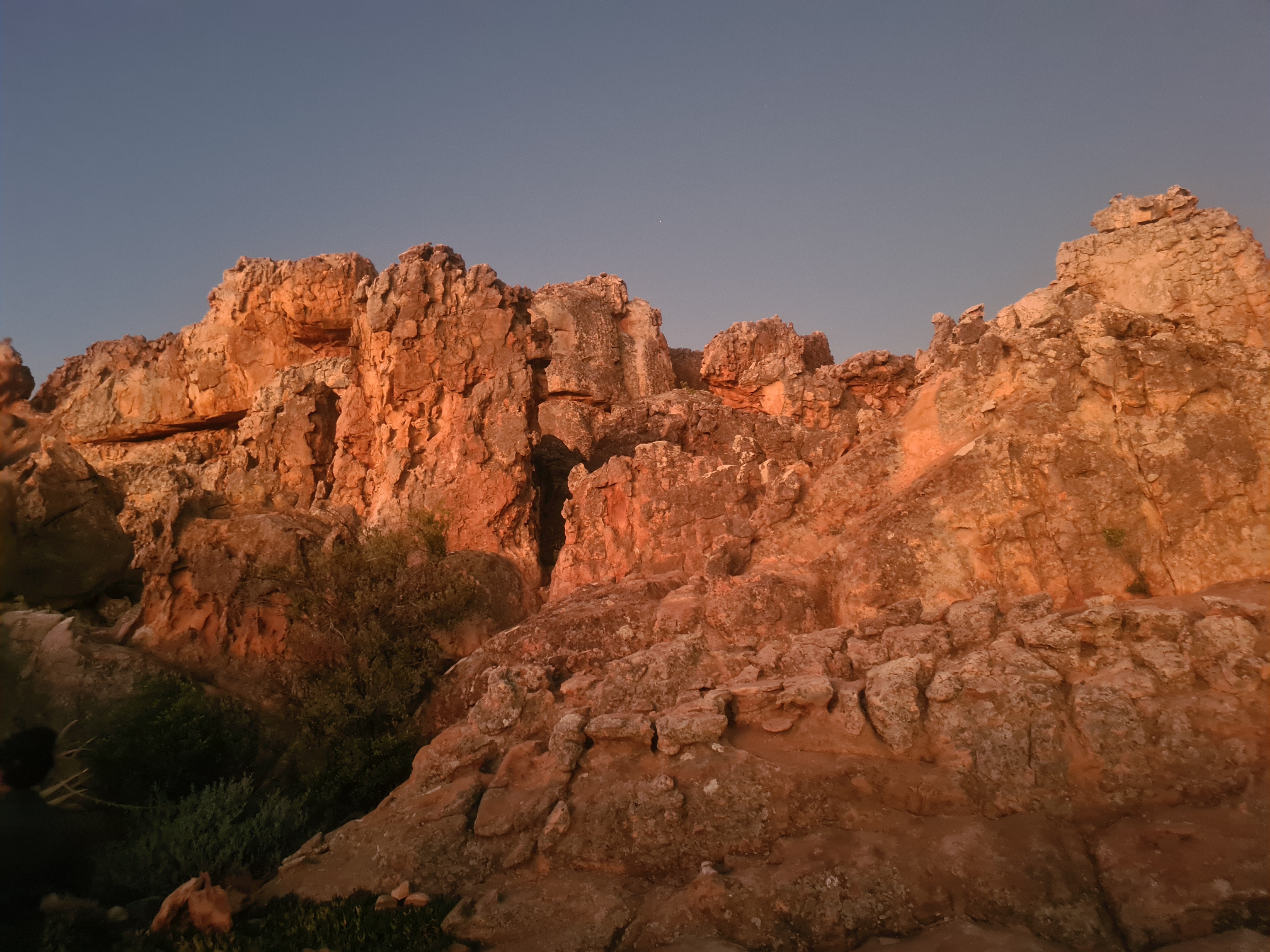 Sandstone rock formations aglow at dusk. Image: Carmen Clegg