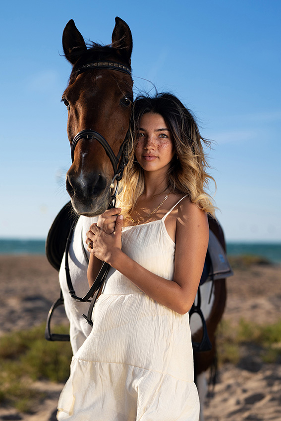 'The Horse Rider'. Anna is a kitesurfer who loves horses. I wanted to take a portrait of her and her beautiful horse at the beach in El Gouna, Egypt, where she spends most of her time training. © Abdelrahman Gabr, Egypt, Winner, National Awards, Sony World Photography Awards 2023