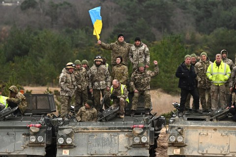 Ukraine defends frontline, Putin talks up nuclear arsenal on eve of war anniversary