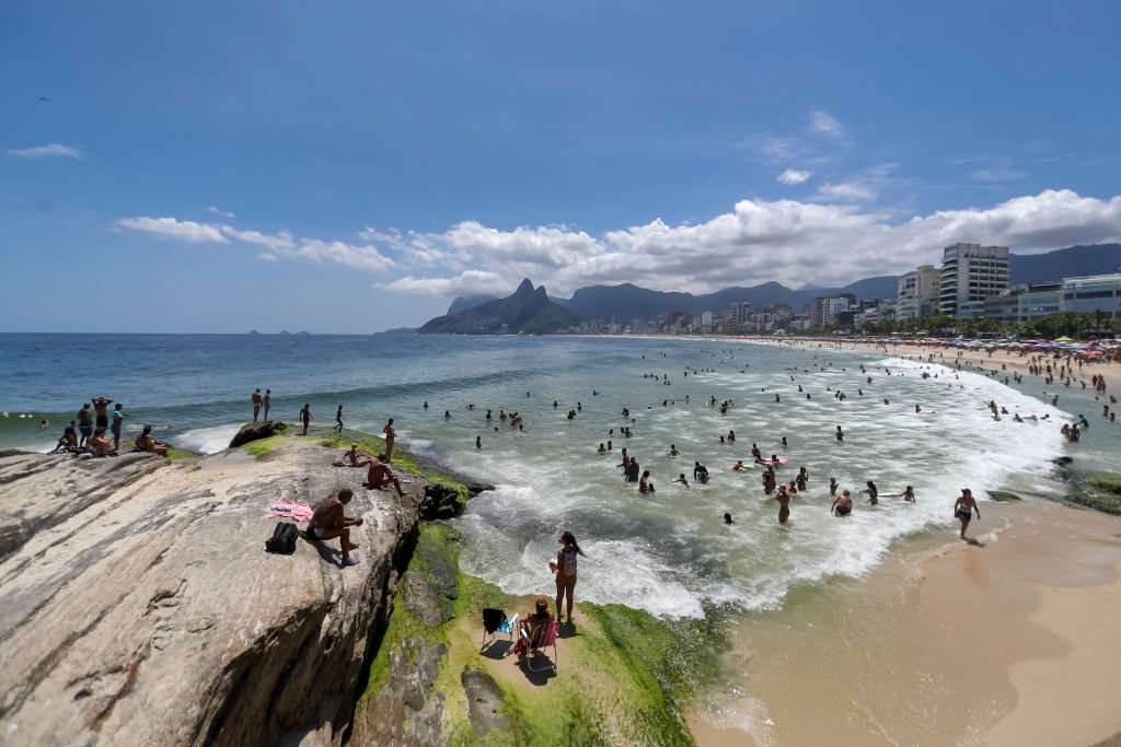 RIO DE JANEIRO, BRAZIL - JANUARY 27: Tourists and Locals Enjoy Summer at Arpoador beach on January 27, 2023 in Rio de Janeiro, Brazil. (Photo by Buda Mendes/Getty Images)