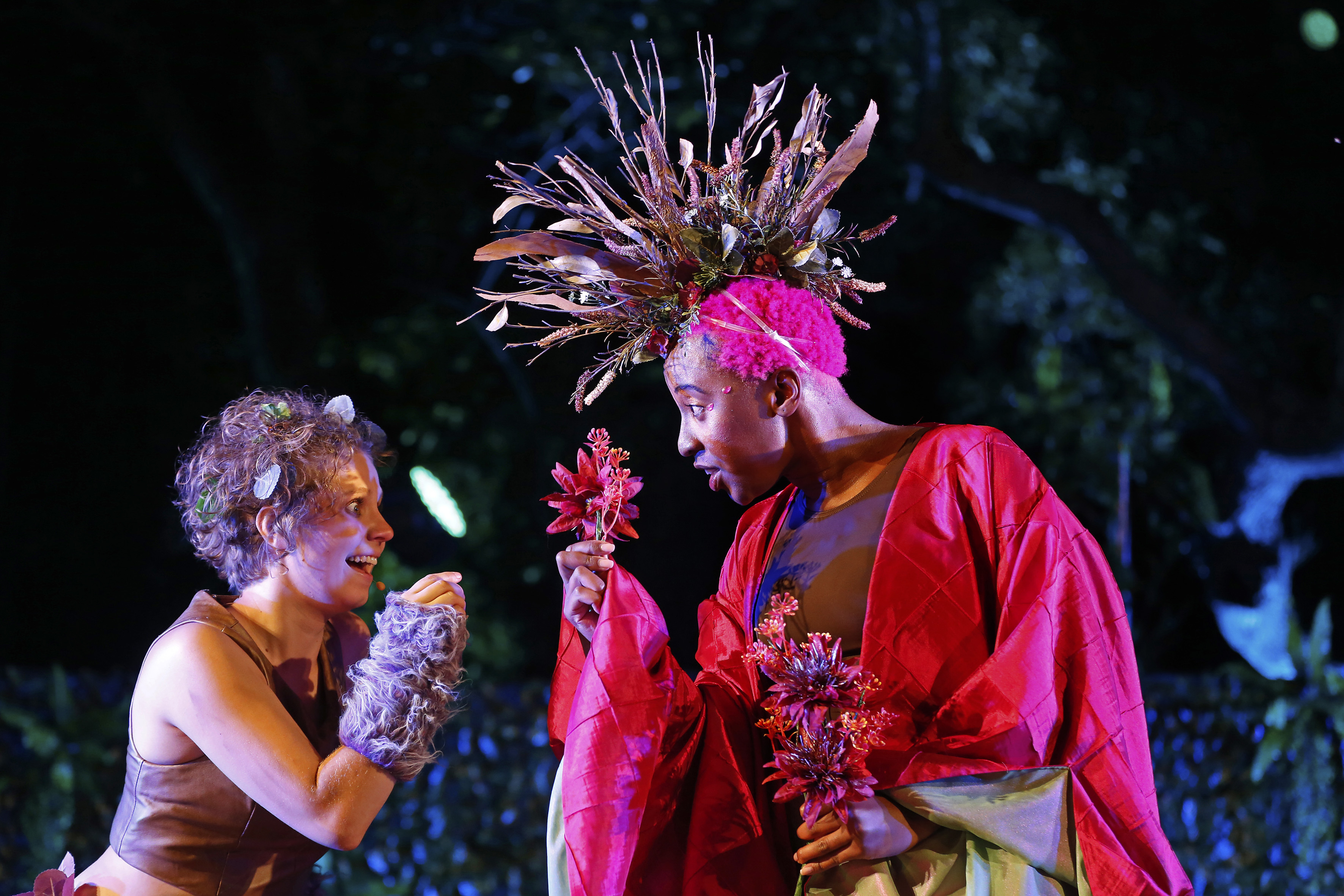 Puck (Sophie Joans) and Oberon (Chi Mhende) conspire in Shakespeare's 'A Midsummer Night's Dream' at Maynardville. Image: Mark Wessels