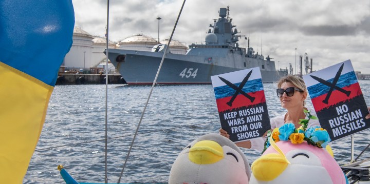 Ukrainians in Cape Town sail yacht close to Russian frigate to protest against naval exercise
