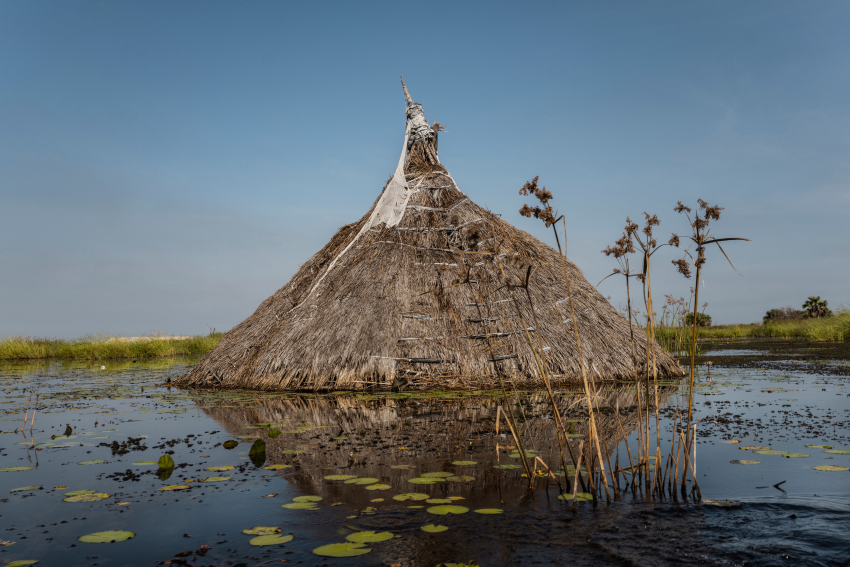A tukul – a typical house in South Sudan – in floodwaters near Mayendit, Unity state, South Sudan. Unprecedented flooding has submerged large swathes of the country and displaced hundreds of thousands of people. In the villages, most of the houses are built with straw wood and plastic sheeting, which has further aggravated the consequences of the floods. South Sudan has been plagued by political violence and instability since its independence from Sudan in 2011. Now it is experiencing massive floods for the fourth consecutive year. Since 2019, unprecedented rainy seasons have submerged large parts of the country’s landscape. Heavy rains and floods have swept away people’s homes, properties, crops, livestock, schools and healthcare centres, and caused extensive infrastructural damage to roads and bridges. The climate crisis is bringing further challenges to this already vulnerable country. © Fabio Bucciarelli, Italy, Finalist, Professional competition, Landscape, Sony World Photography Awards 2023