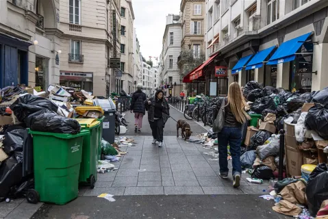 In images: 9,000 tons of rubbish left on the streets of Paris turn city of love into city of trash