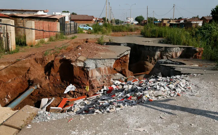 A community at risk of being swallowed by hazardous, neglected sinkholes in Khutsong