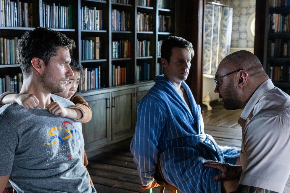 Andrew (Ben Aldridge), Wen (Kristen Cui), Eric (Jonathan Groff) and Leonard (Dave Bautista) in 'Knock at the Cabin', directed by M. Night Shyamalan. Image: Universal Pictures / Supplied