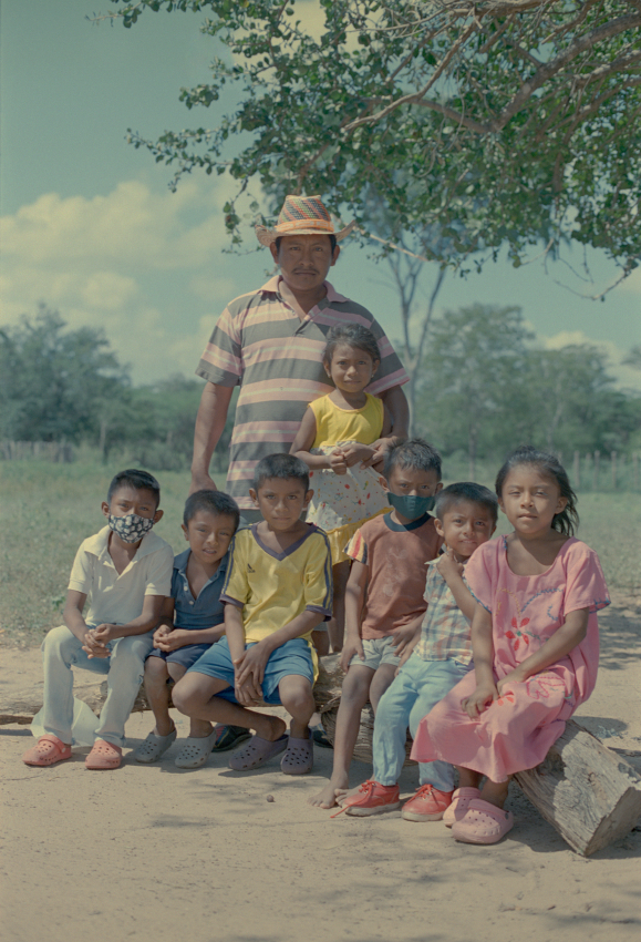A group of Wayuu children in Polumacho with Emilio, the leader of the village, in November 2021. Emilio told us: ‘At the moment we don’t have enough water; what water we do have we can’t use for drinking. The times of drought have always been difficult. That happens in the months of January, February, from then for about three or four months. If the year goes by and it doesn’t rain, it is very difficult.’ Miruku focuses on the Wayuus, an indigenous population from La Guajira, Colombia’s coastal desert. Commissioned by 1854/British Journal of Photography and WaterAid, the project examines how a combination of climate change issues and human negligence have led its various members to experience a stifling water shortage. In the region, the problem is cyclical and polymorphous. While some communities can achieve certain stability during rainy seasons, temperatures are bound to rise, drying up the land again. Global warming only aggravates this, causing droughts and famine, and spoiling the facilities and installations that help source clean water. We framed the story from a female perspective to get a better understanding of how gender inequality and climate vulnerability interrelate. We sought to highlight the strength and resourcefulness of the Wayuu women, as we found it inspiring that, even under such conditions, they have established themselves as community leaders, teachers and climate activists. Through our diptychs we wanted to convey a visual balance between a raw and a lyrical documentation, and achieve a nuanced portrayal of a multihued situation. © Marisol Mendez (Bolivia) & Federico Kaplan (Argentina), Finalist, Professional competition, Environment, Sony World Photography Awards 2023