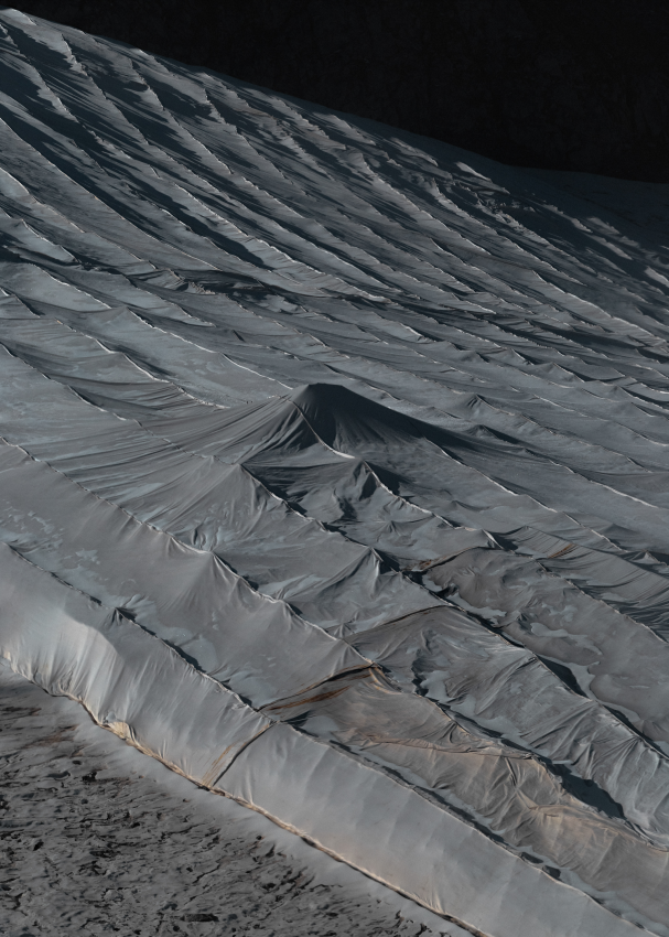 A view of the Presena glacier, near Passo Del Tonale, covered with geotextile sheets to protect it from melting during the summer months. This type of covering is used in numerous ski resorts in Italy, France, Austria and Germany. On this glacier, the surface area of the sheets has increased from 20,000m² to 100,000m² in just over a decade. For a few weeks in 2021, something unusual happened to the mountains near the Tonale pass in Italy: they were covered with hundreds of metres of immaculate sheets, sparkling under the sun’s rays and reacting like sails to every gust of wind. The reason for this is an attempt is being made to save the Presena glacier on the border between Lombardy and Trentino-Alto Adige. This giant has been dying for some decades now, but to protect it from melting the slopes of this glacier are covered with geotextile sheets placed by the Pontedilegno-Tonale consortium. However, even with this protection, the melting shows no signs of subsiding, and proceeds at an ever more pressing pace. © Francesco Merlini, Italy, Shortlist, Professional competition, Landscape, Sony World Photography Awards 2023