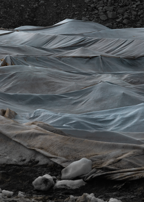 A detail of the Presena glacier, near Passo Del Tonale, covered with geotextile sheets placed by the Pontedilegno-Tonale consortium to protect it from melting during the summer months. The sheets cover about 100,000 m² of the glacier. For a few weeks in 2021, something unusual happened to the mountains near the Tonale pass in Italy: they were covered with hundreds of metres of immaculate sheets, sparkling under the sun’s rays and reacting like sails to every gust of wind. The reason for this is an attempt is being made to save the Presena glacier on the border between Lombardy and Trentino-Alto Adige. This giant has been dying for some decades now, but to protect it from melting the slopes of this glacier are covered with geotextile sheets placed by the Pontedilegno-Tonale consortium. However, even with this protection, the melting shows no signs of subsiding, and proceeds at an ever more pressing pace. © Francesco Merlini, Italy, Shortlist, Professional competition, Landscape, Sony World Photography Awards 2023