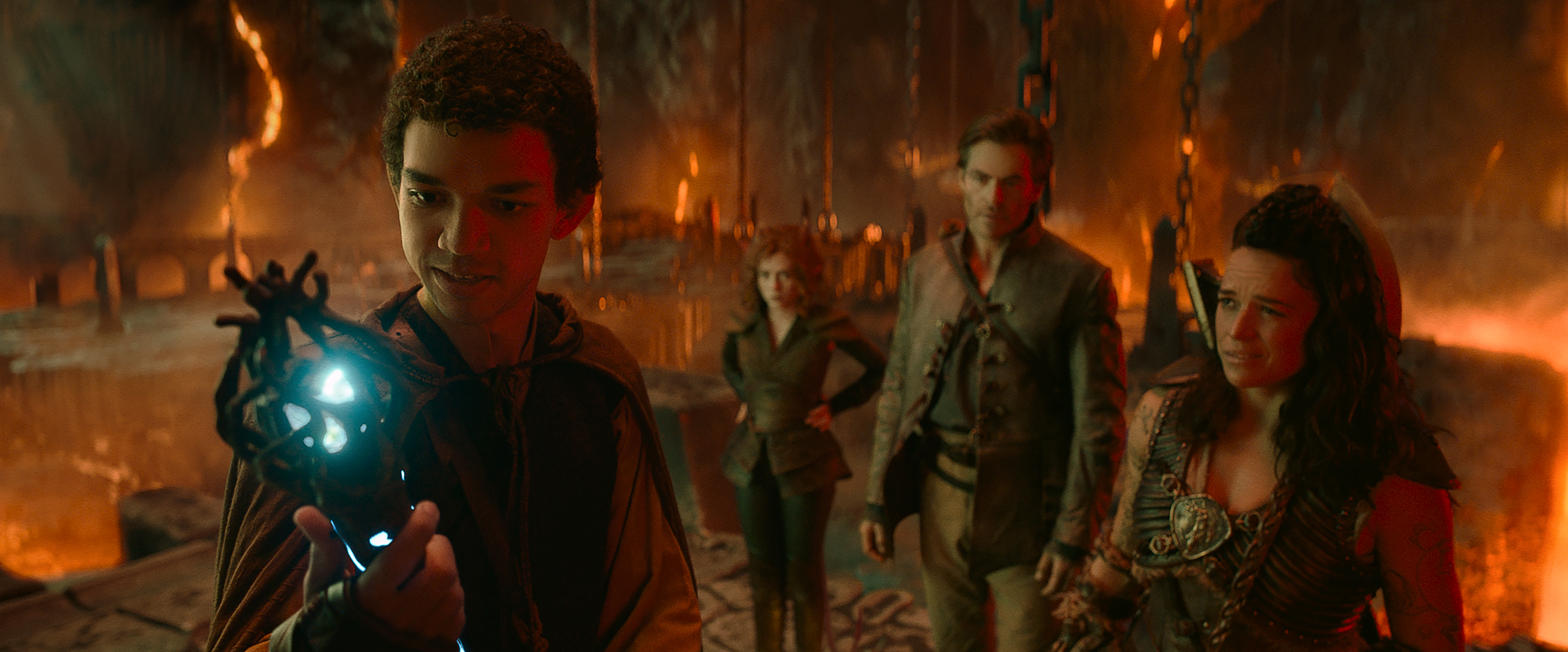 Justice Smith plays Simon, Sophia Lillis plays Doric, Michelle Rodriguez plays Holga and Chris Pine plays Edgin in 'Dungeons & Dragons: Honor Among Thieves'. Image: Paramount Pictures / eOne / Supplied