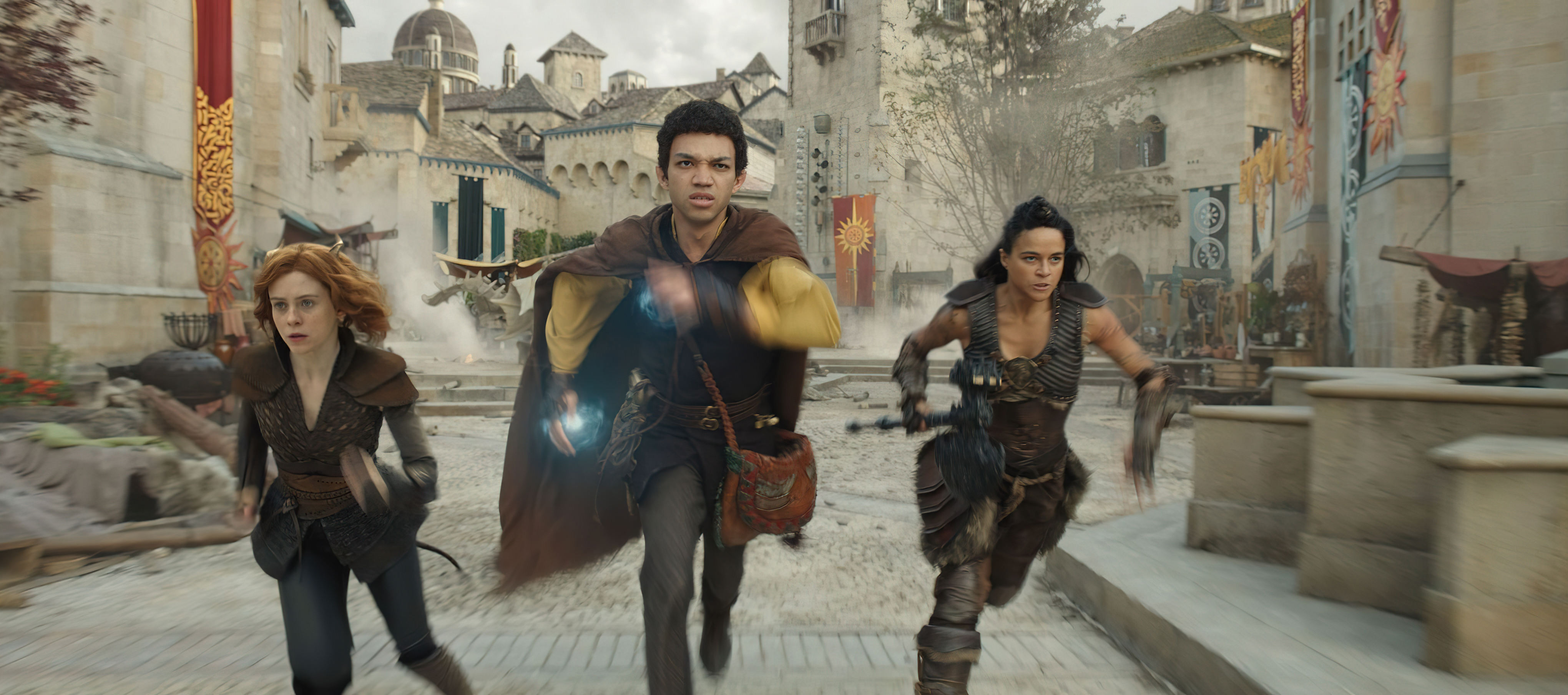Sophia Lillis plays Doric, Justice Smith plays Simon and Michelle Rodriguez plays Holga in 'Dungeons & Dragons: Honor Among Thieves'. Image: Paramount Pictures / eOne / Supplied