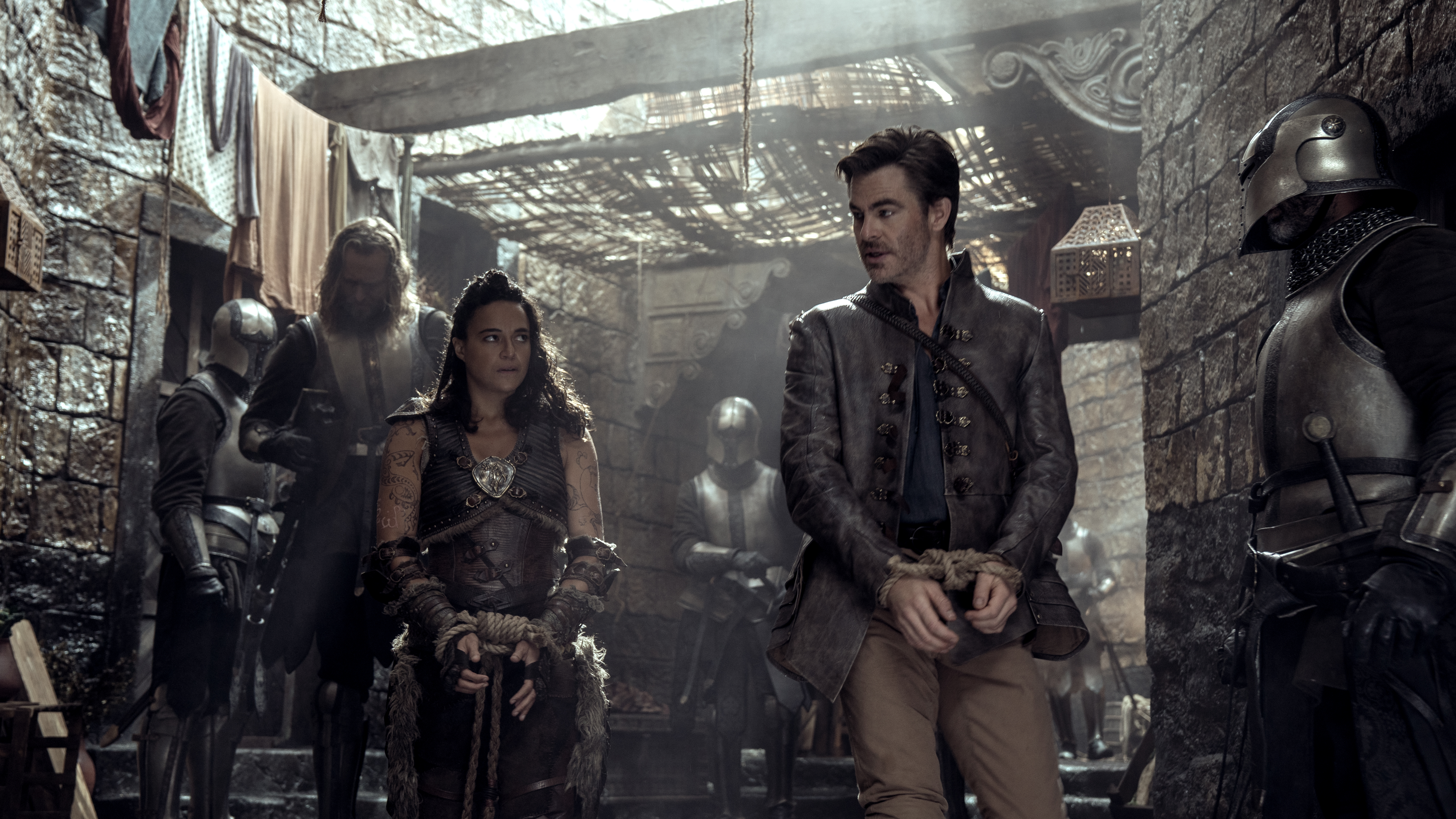 Michelle Rodriguez plays Holga and Chris Pine plays Edgin in 'Dungeons & Dragons: Honor Among Thieves'. Image: Paramount Pictures / eOne / Supplied