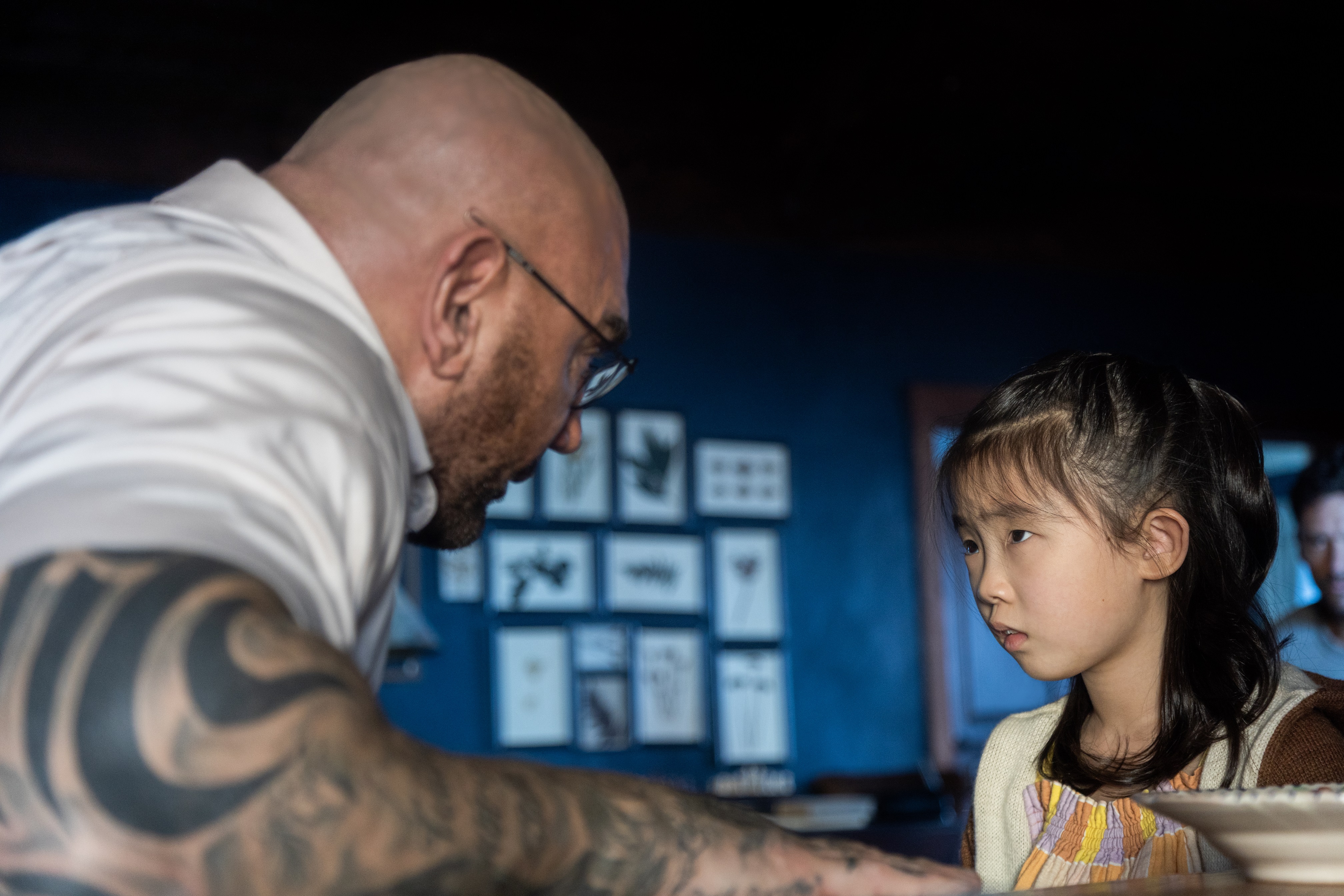 Dave Bautista and Kristen Cui in 'Knock At The Cabin'. Image: Universal Pictures / Supplied