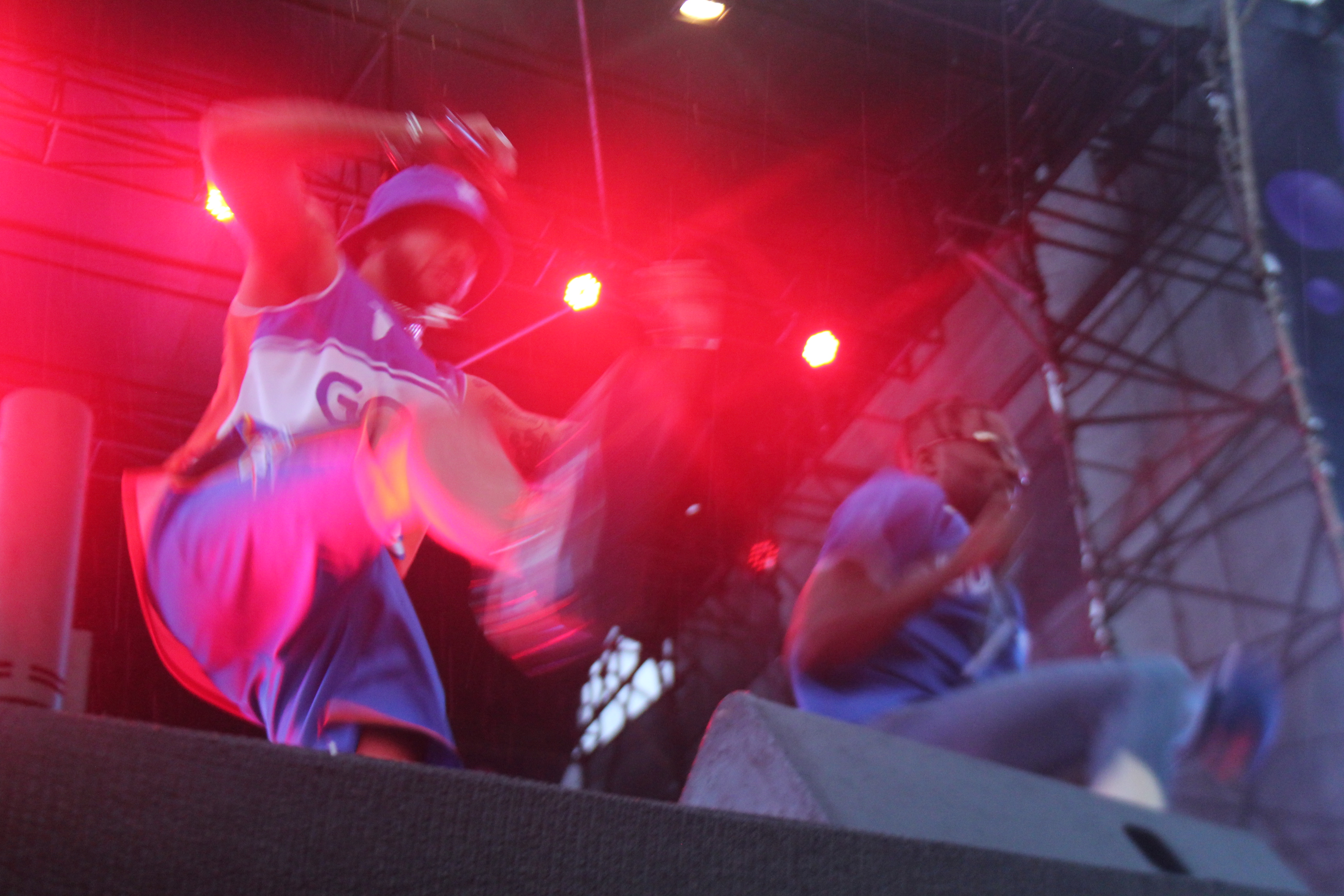 YoungstaCPT in action, refusing to let the rain stop the showat the Galaxy KDay Festival. Image: Oren-Andrew Wentzel