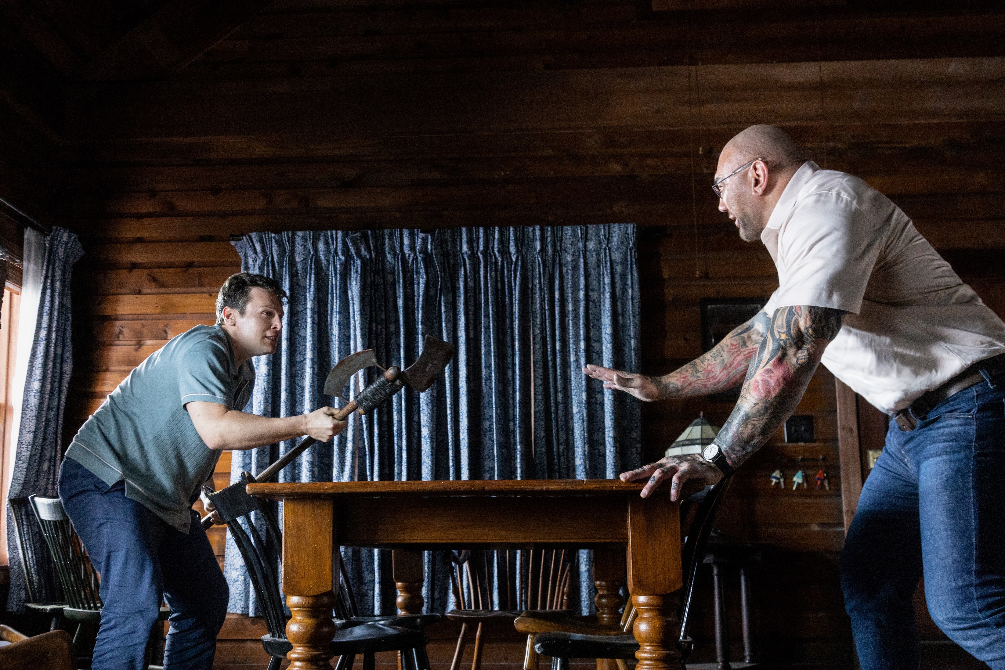 Jonathan Groff and Dave Bautista in 'Knock At The Cabin'. Image: Universal Pictures / Supplied