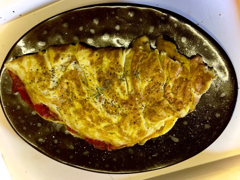 What’s cooking today: Cheese, tomato and onion omelette