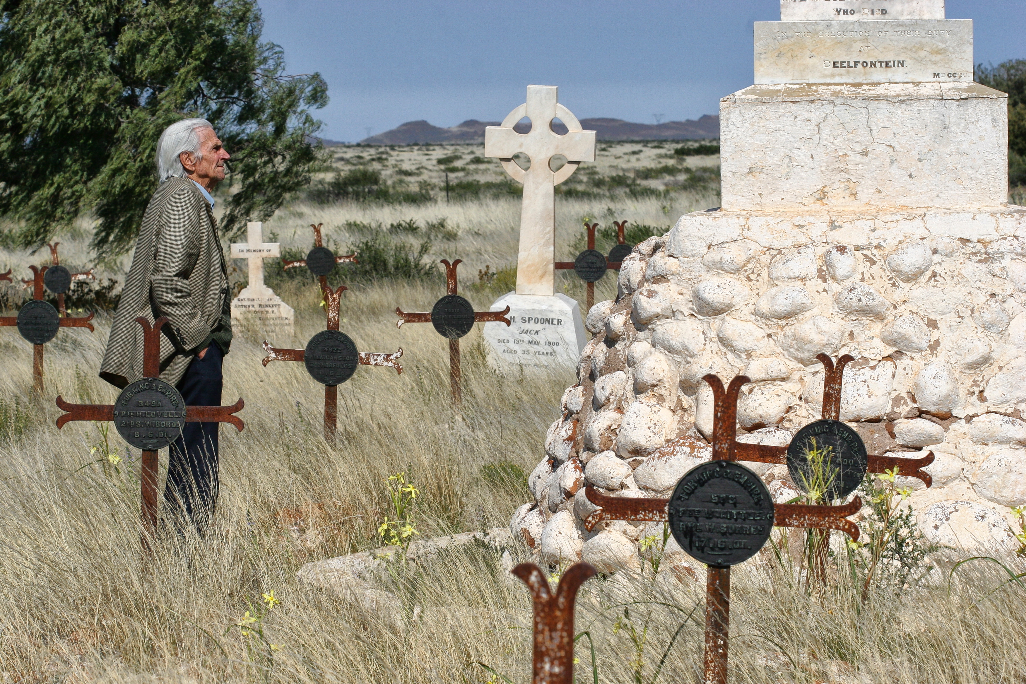 The late Percy Moss, lost in memories at the Deelfontein cemetery.