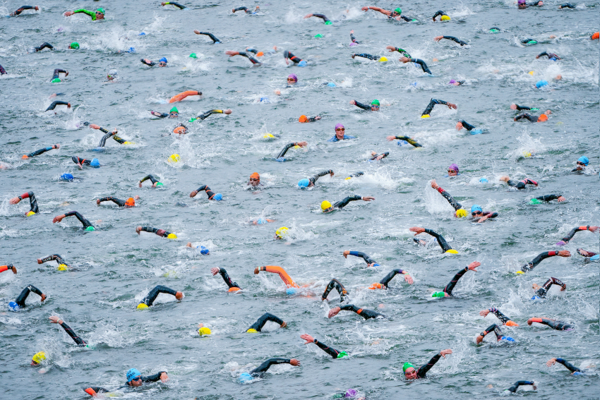 'Marea Humana'. Swimmers in the Bilbao estuary during the 2022 Multisport Triathlon European Championship. © Pedro Luis Ajuriaguerra Saiz, Spain, Shortlist, Open Competition, Motion, 2023 Sony World Photography Awards