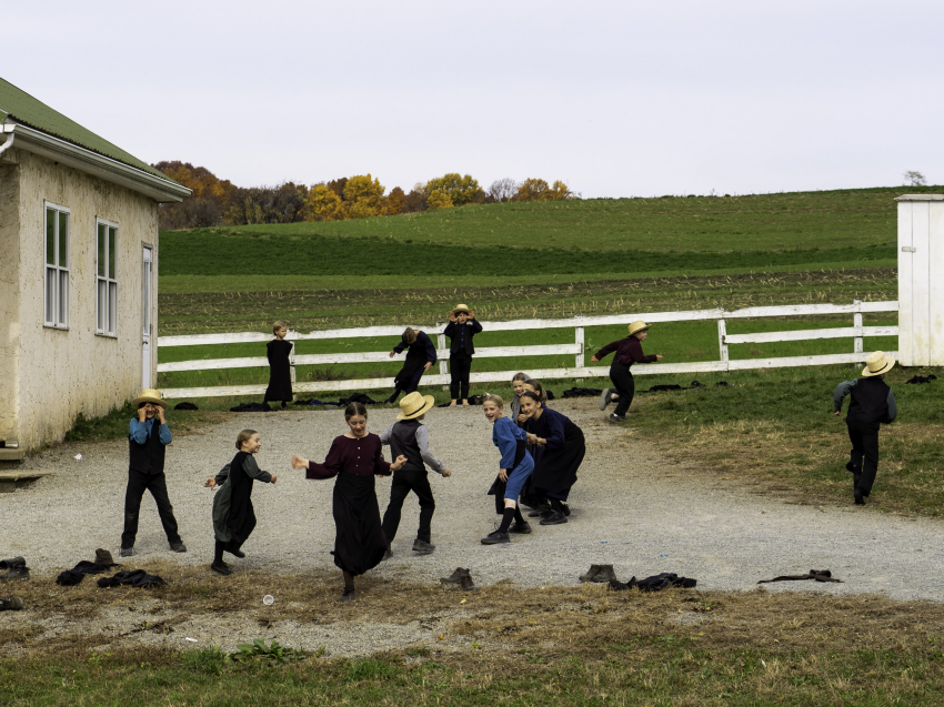Playtime in an Amish schoolyard. This photograph was taken from a moving car in October 2022. © Jean Veron, France, Shortlist, Open Competition, Lifestyle, 2023 Sony World Photography Awards