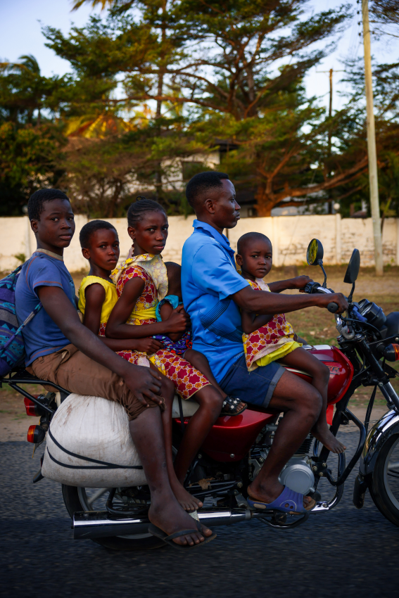 'Sunday Morning'. Whenever I’m travelling, I always keep my camera within reach. This turned out to be very useful on my way to Watamu, Kenya, as I had the opportunity to photograph this family man taking his children to the market on his motorbike. © Francesco Bambi, Italy, Shortlist, Open Competition, Lifestyle, 2023 Sony World Photography Awards