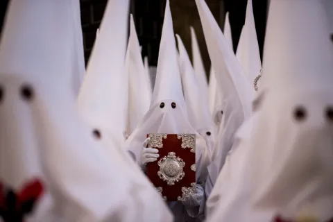 In images: Penitents take part in processions during the Holy Week in Spain