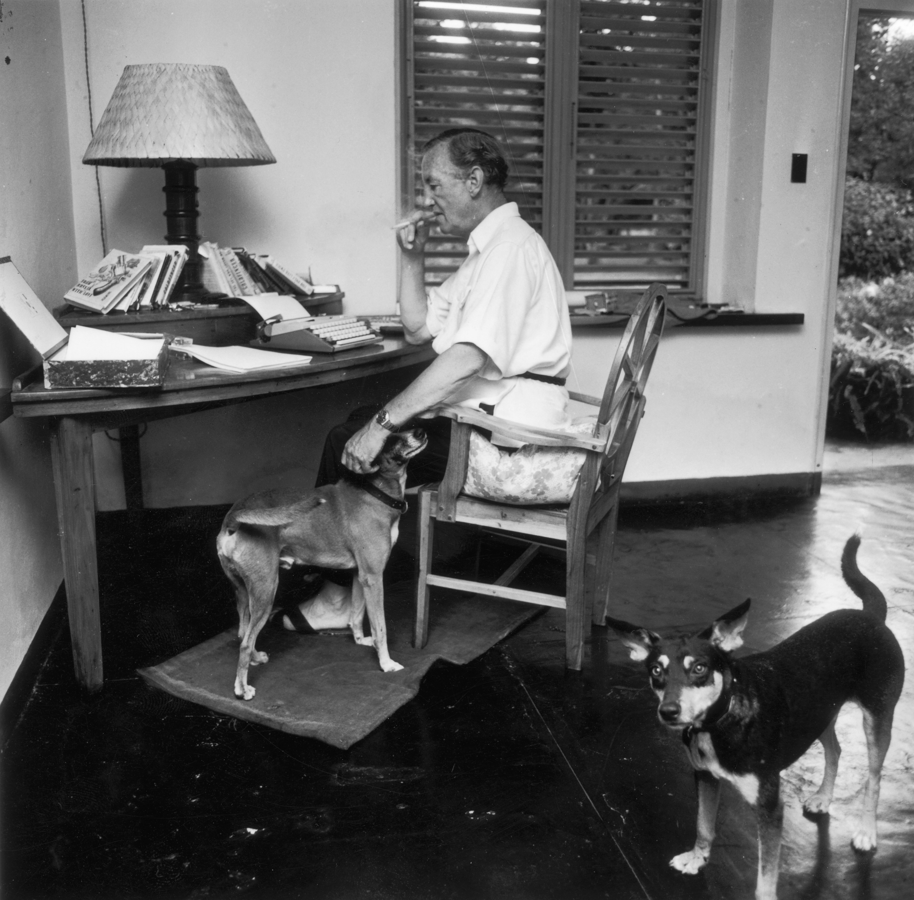 23rd February 1964: English writer Ian Fleming (1908 - 1964), best known for his James Bond novels, in his study at Goldeneye, his Jamaican home. (Photo by Harry Benson/Express/Getty Images)