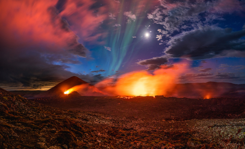 'Surreal Iceland'. Iceland never fails to amaze me. I last went there to see a volcano erupting and was lucky enough to get there on the last day that it was still spilling lava. As a bonus, we also got the moon and the first aurora of the season. © Fabian Pfeifhofer, Italy, Shortlist, Open Competition, Travel, 2023 Sony World Photography Awards