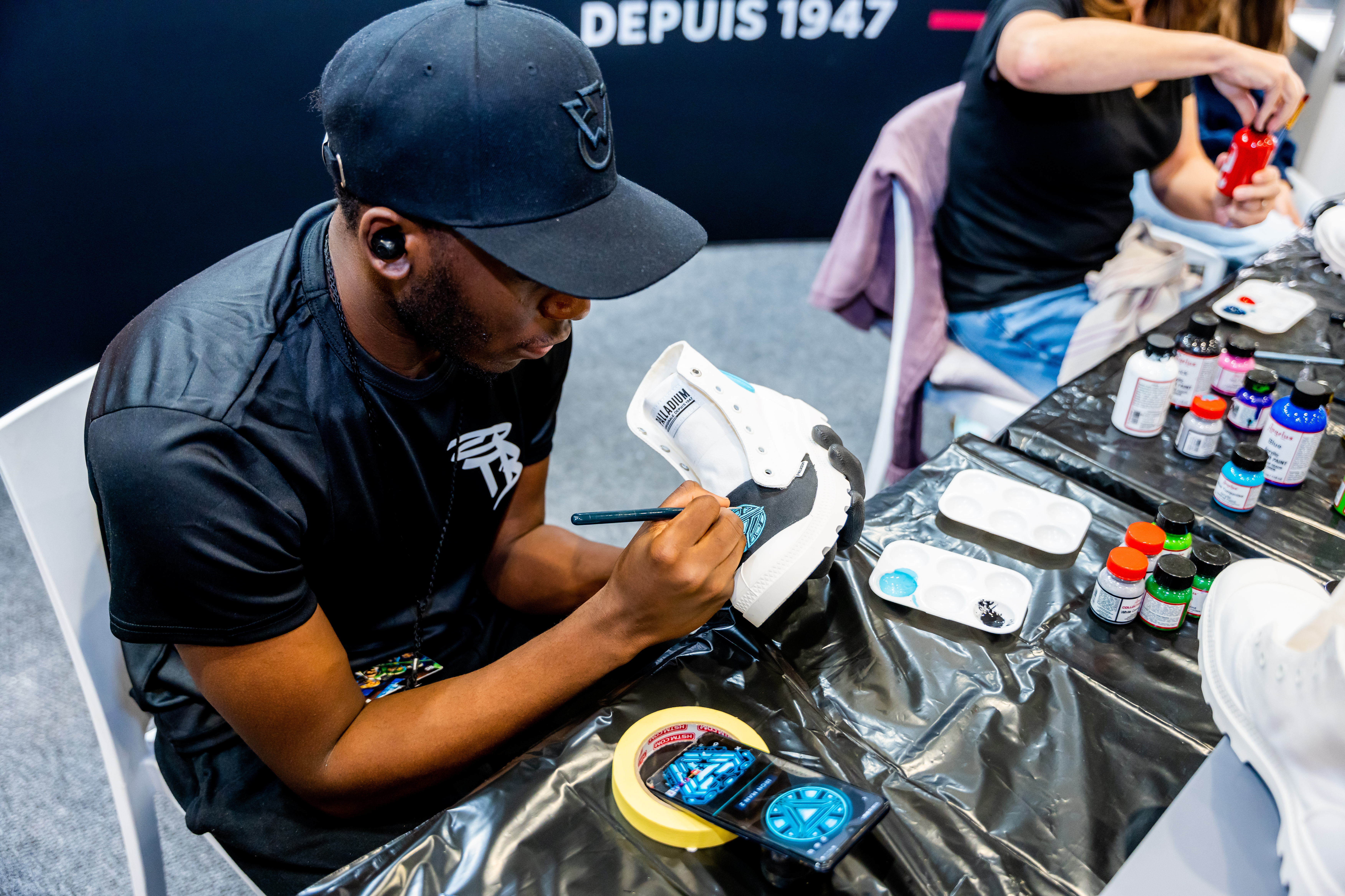 Sneaker painting at Comic Con Cape Town. Image: Matthew Sleep