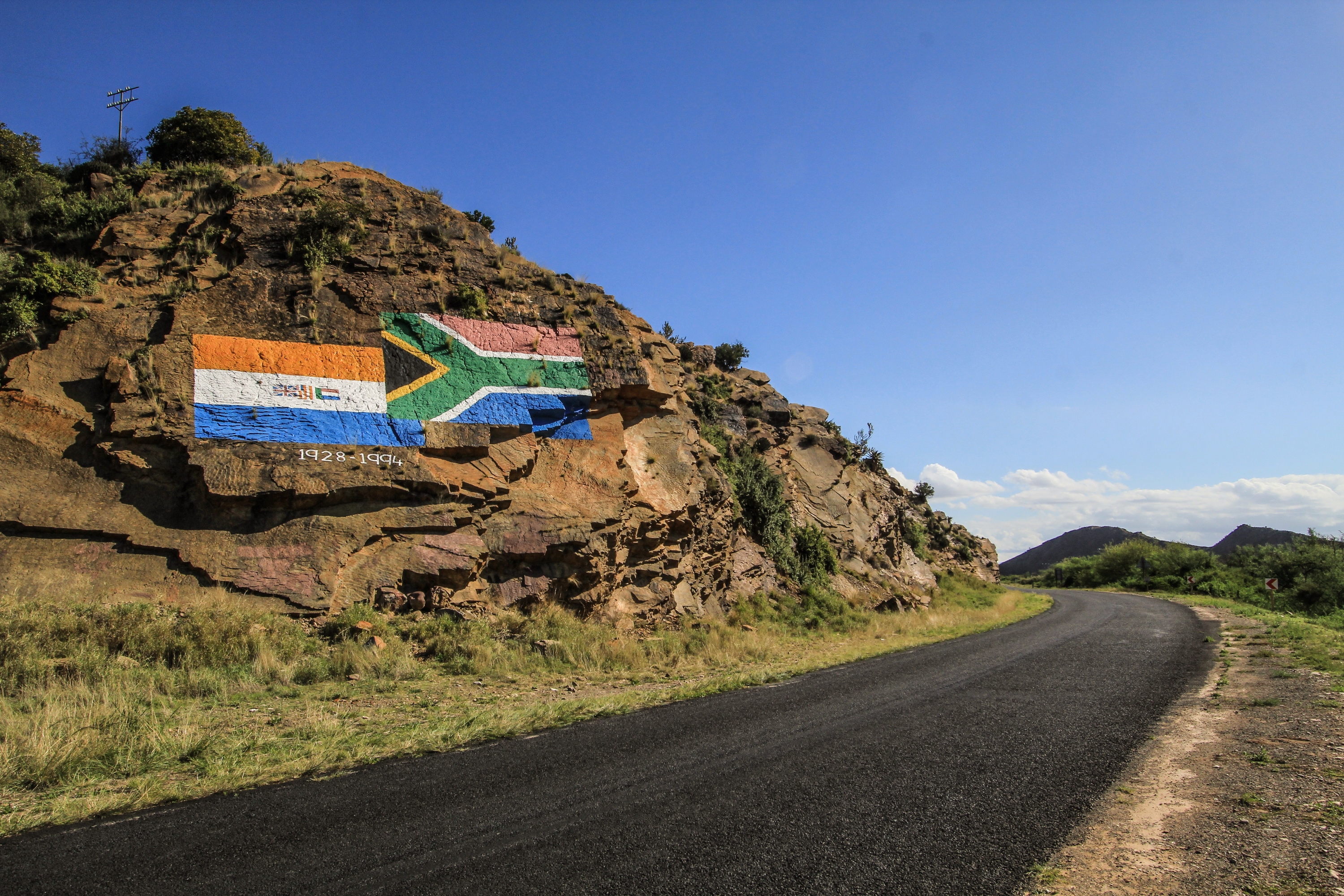 The old and the new, side by side, as part of Steytlerville’s Valley of the Flags. Image: Chris Marais