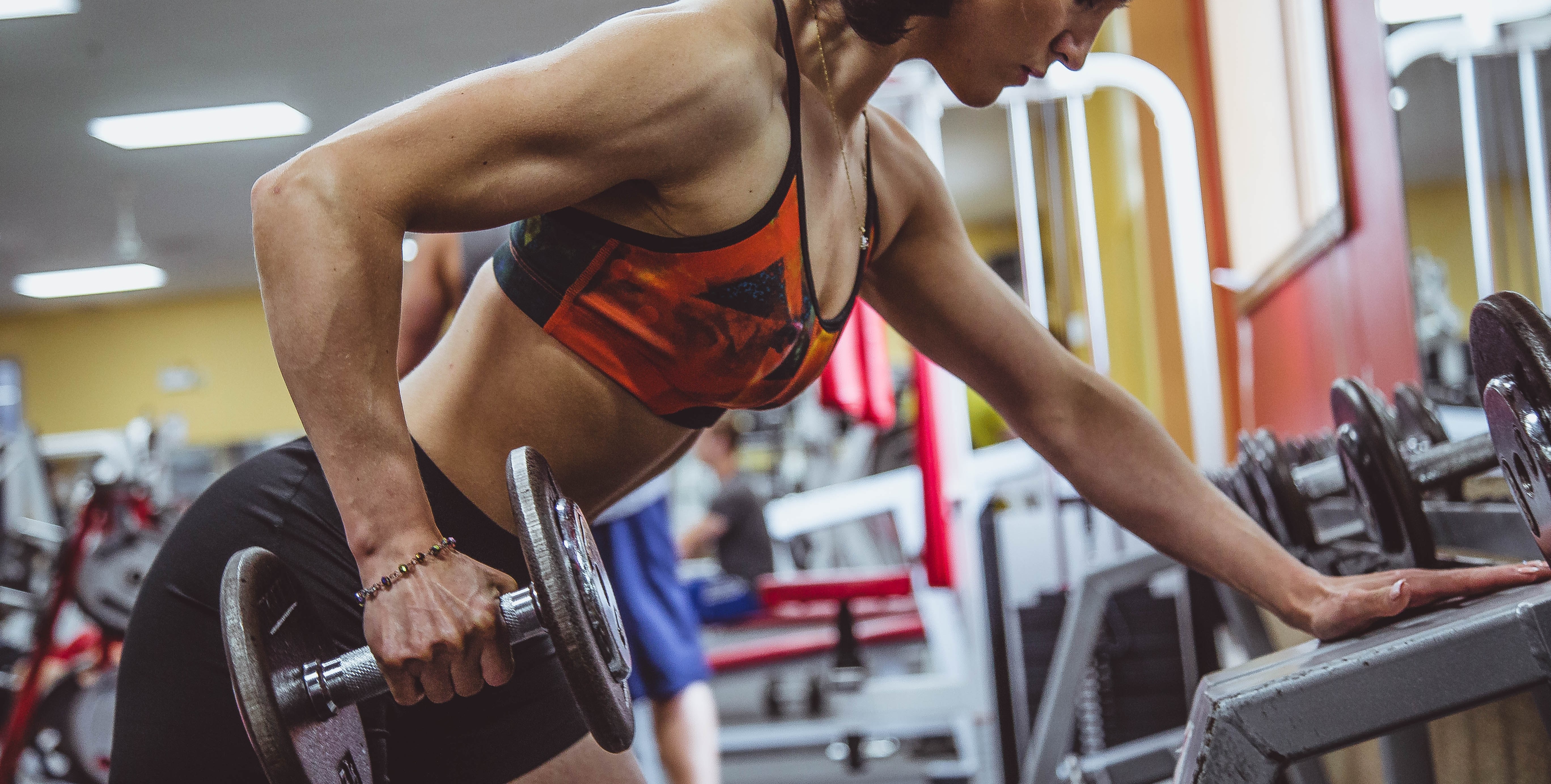 Weightlifting may also reduce symptoms of depression and anxiety. Image: Alora Griffiths / Unsplash