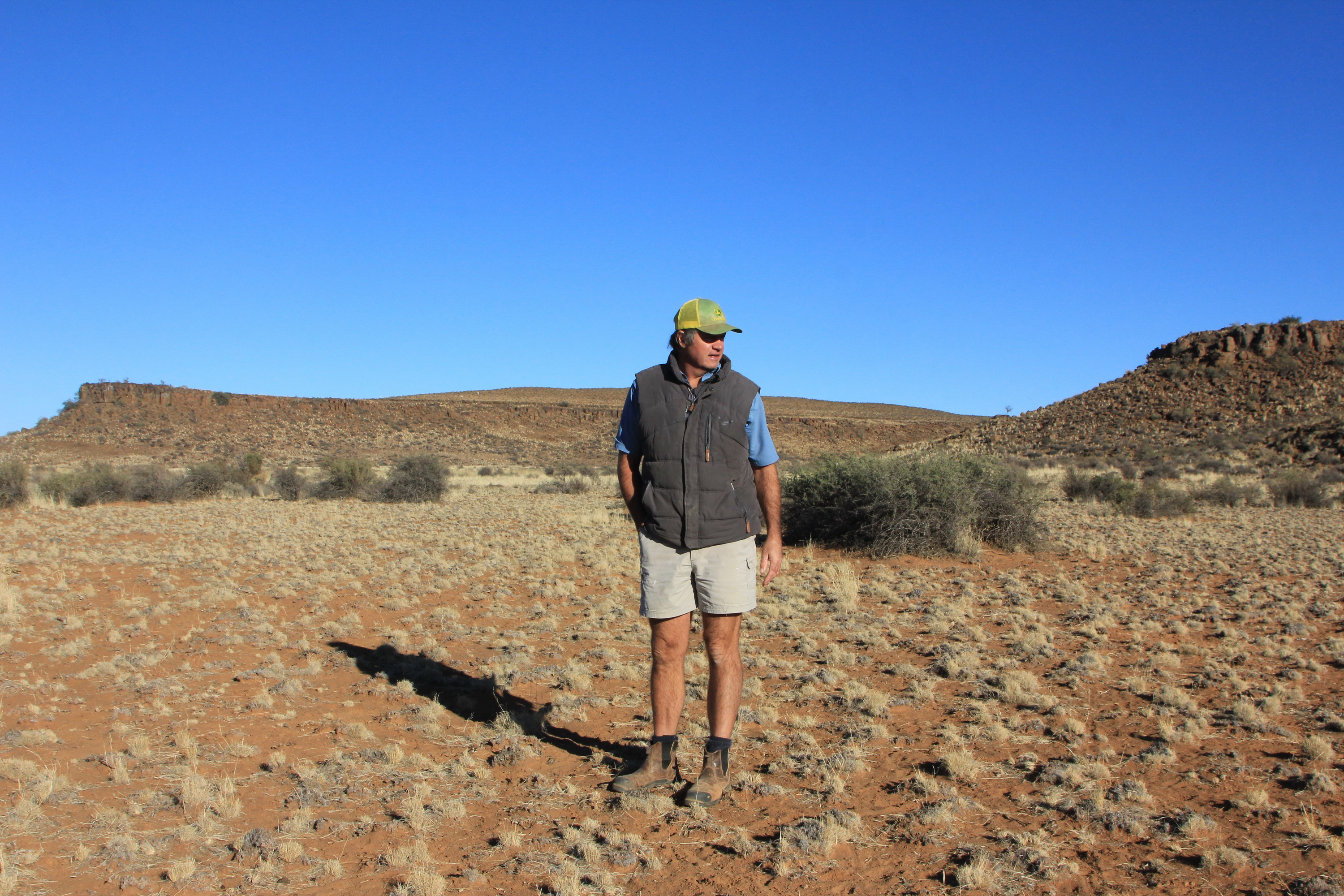 Peter in the veld on Langbaken Farm, as the eight-year drought was being relieved. Image: Chris Marais