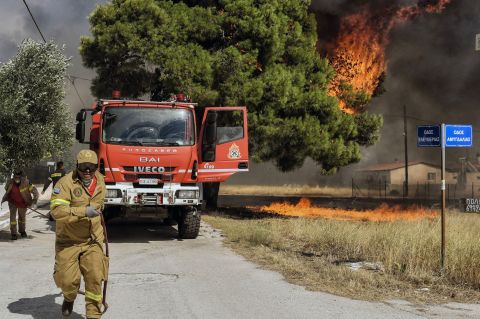 Wildfires move closer to Athens during high winds and temperatures