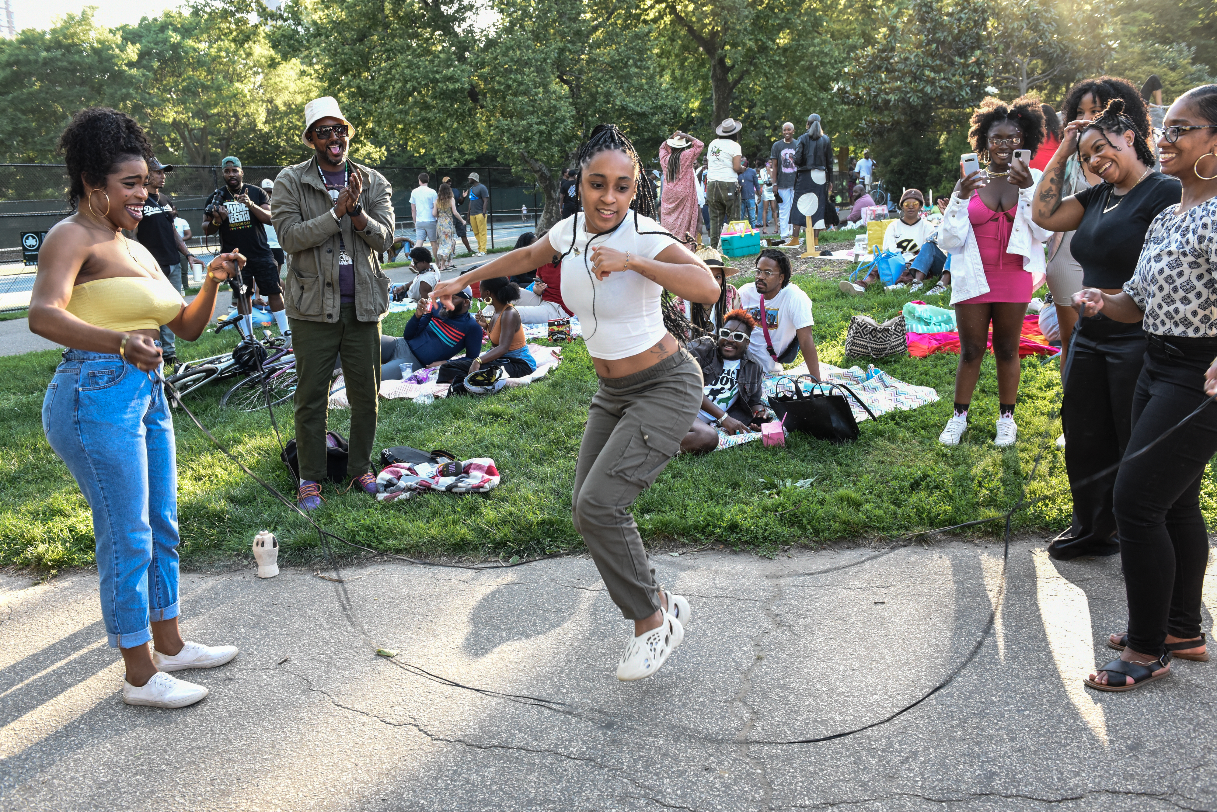 People play double dutch during a Juneteenth celebration in Fort Greene Park on June 19, 2022 in the Brooklyn borough of New York City. President Biden made Juneteenth a federal holiday in June 2021, proclaiming it as a day for all Americans to commemorate the end of slavery. The date's history goes back to the year 1865 when Union troops arrived in Galveston Bay, Texas to deliver the news that slavery had ended after President Abraham Lincoln issued the Emancipation Proclamation on January 1, 1863. (Photo by Stephanie Keith/Getty Images)
