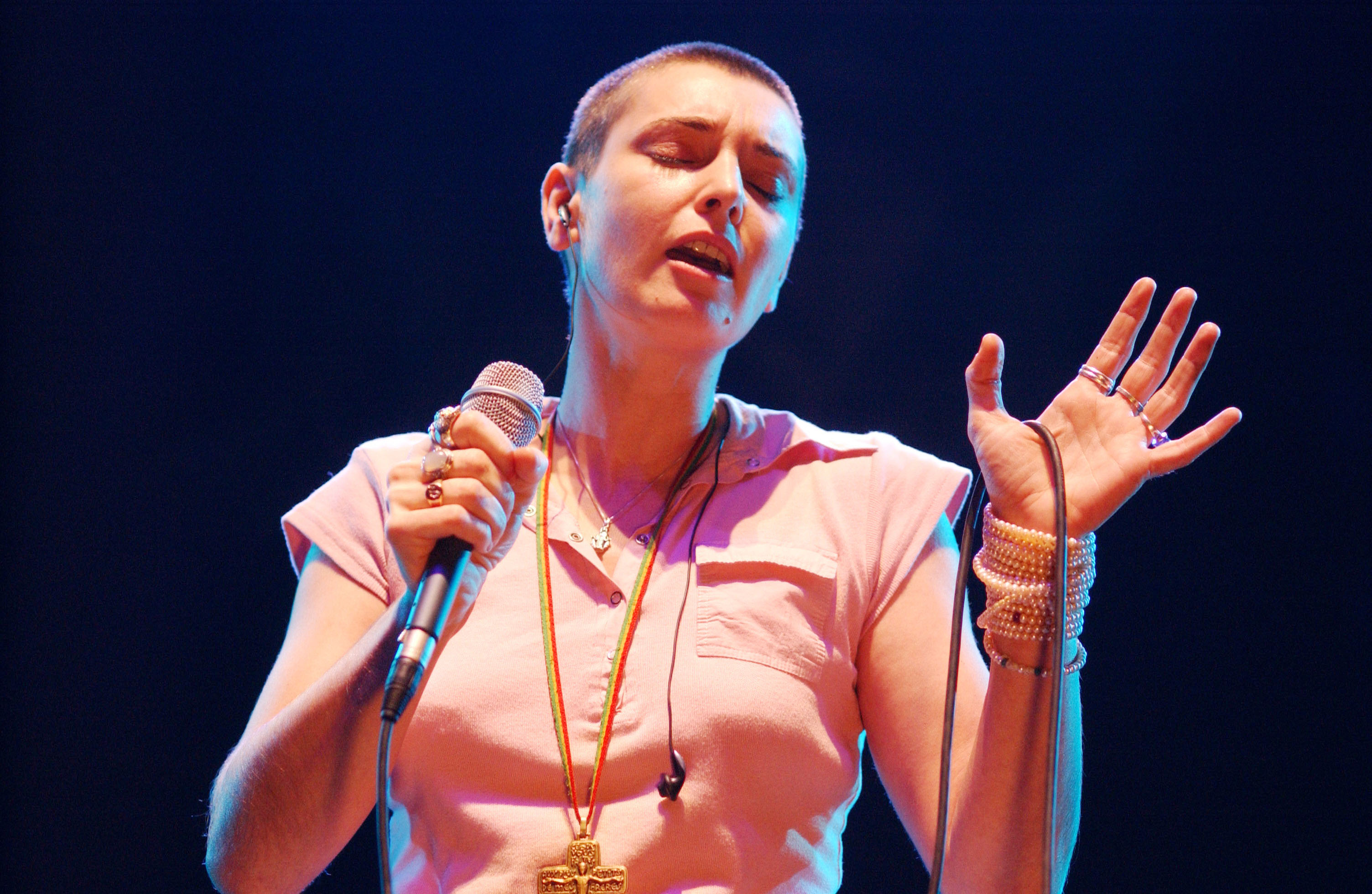 DUBLIN, IRELAND - JANUARY 18: Irish singer Sinead O'Connor sings in concert January 18, 2003 at The Point Theatre in Dublin, Ireland. (Photo by Getty Images)