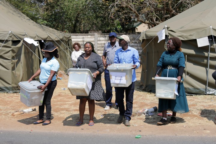 Zimbabwe election results start to trickle in after delays, activist arrests
