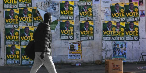 Election posters hang on a wall in Bindura, Zimbabwe on 29 July 2018. (Photo: Waldo Swiegers / Bloomberg via Getty Images)