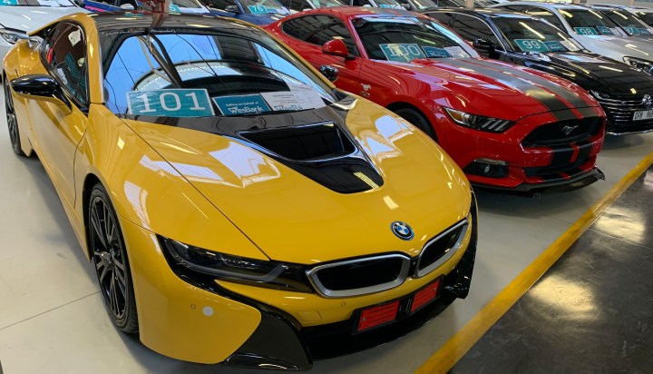 Going once, going twice, conned! Here’s how to avoid car auction scams and drive a hard bargain