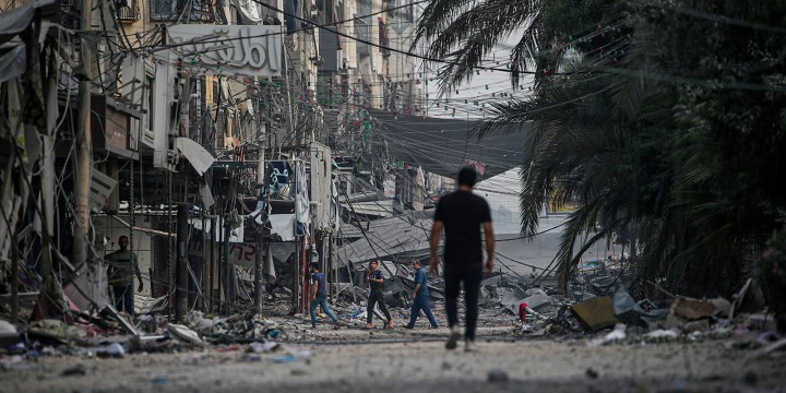 Hamas promises to free foreign captives; deadly strike reported at Gaza refugee camp